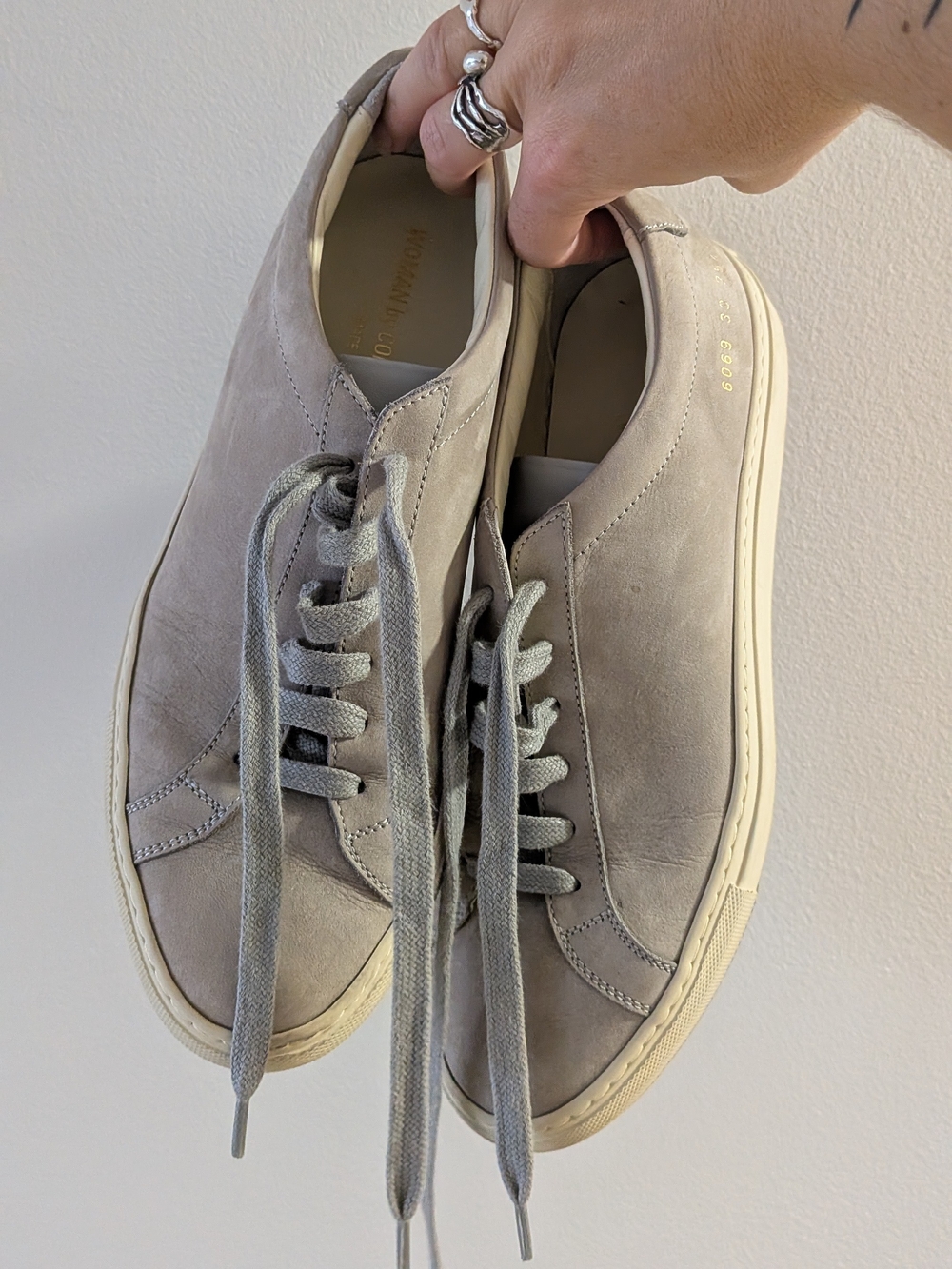Woman by Common Projects Low-Top Sneakers | Nubuck Leather - Grey/Taupe